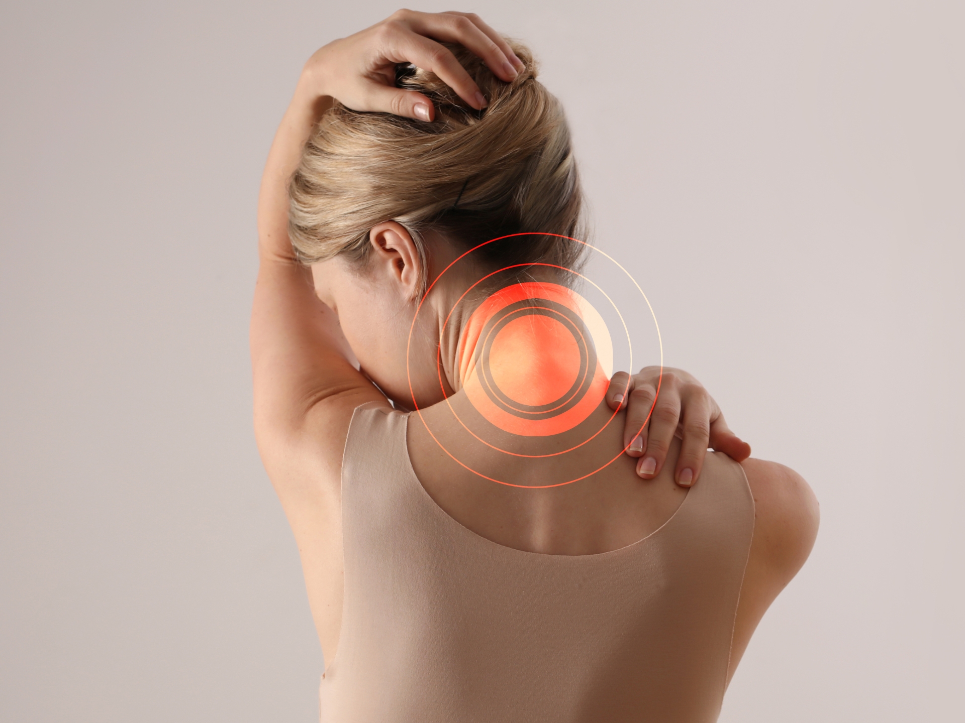 Happy woman holding purple flowers