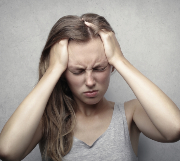 Person walking dog outdoors