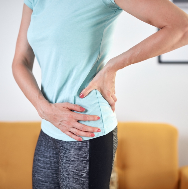 Person walking dog outdoors