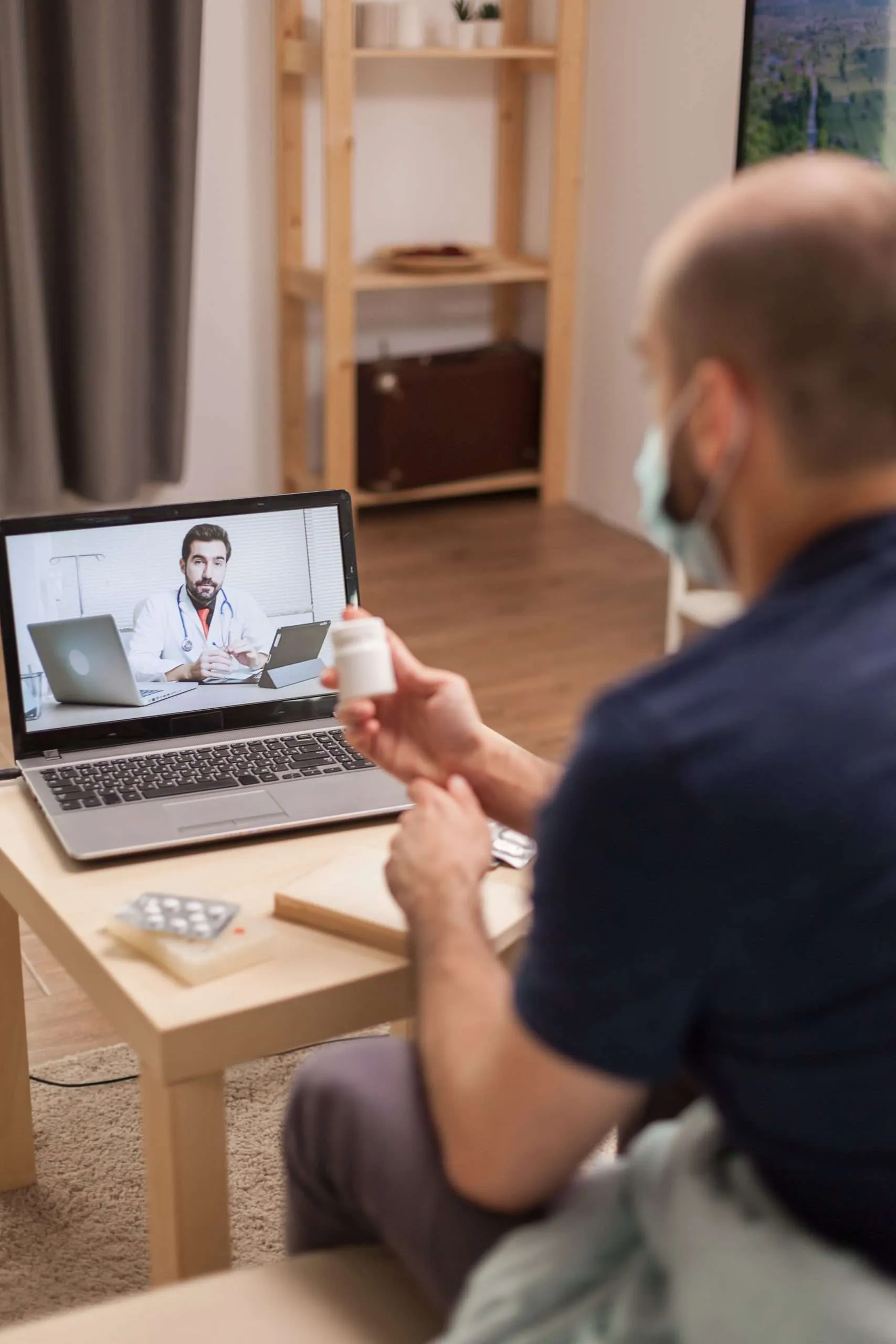 Virtual psychiatry appointment on laptop